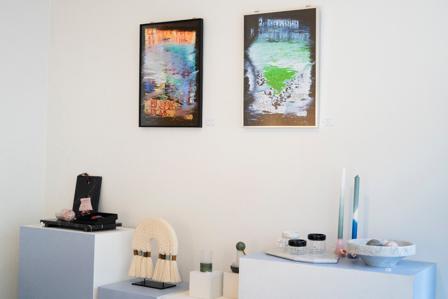 Modern interior framed posters on a white wall.